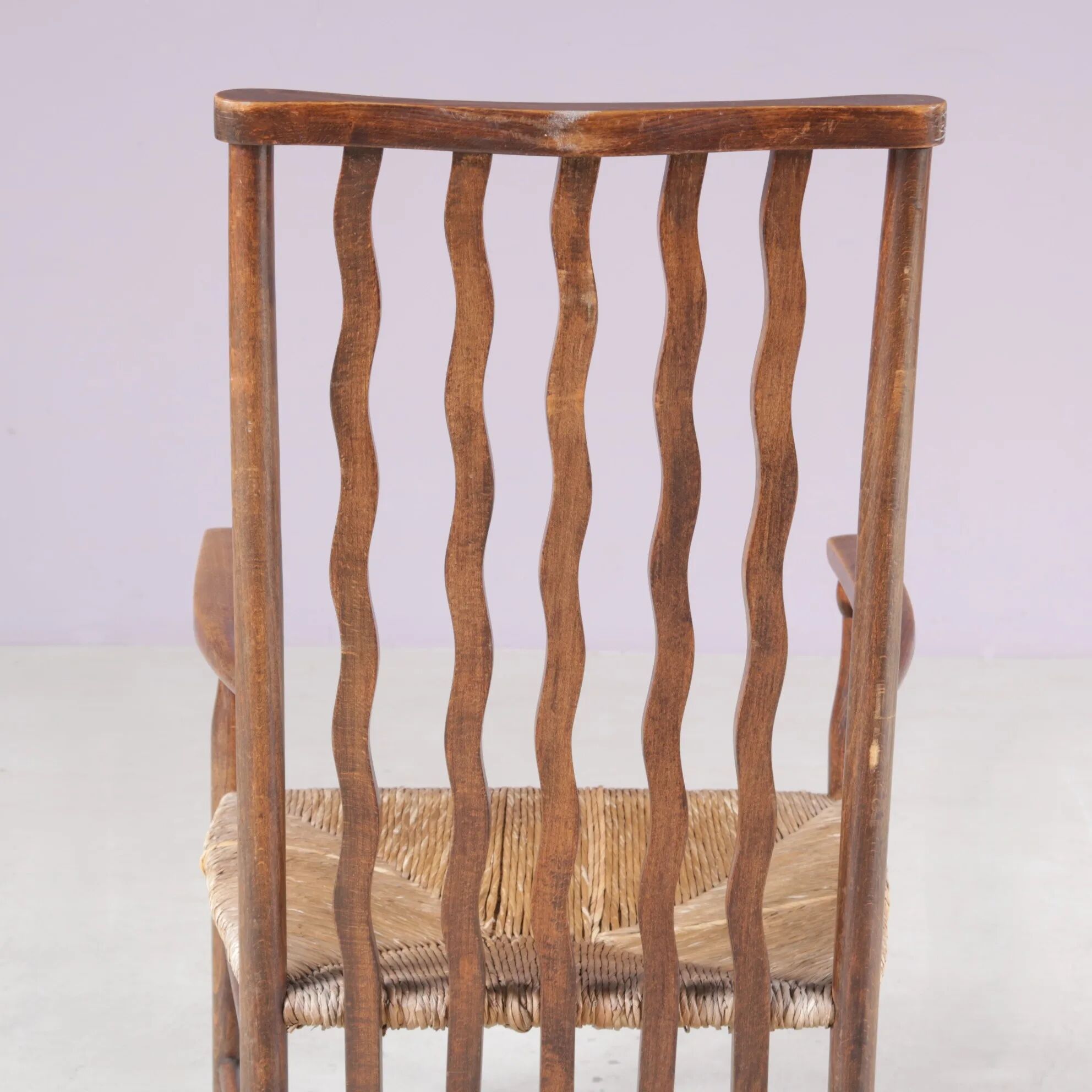 1930s small low spindle-back hearth chair / side chair with wicker seat, Arts & Craft Movement, Morris & Co for Liberty and Co, Stowaway London