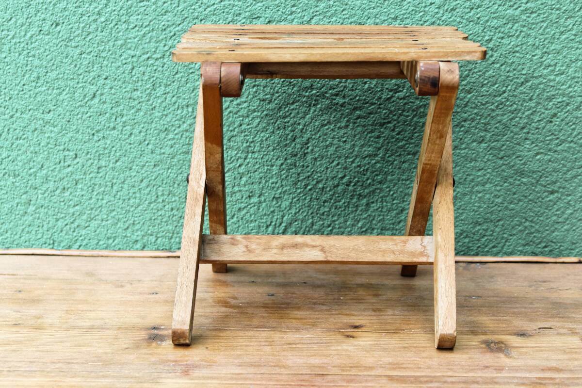 Folding slatted wood stool
