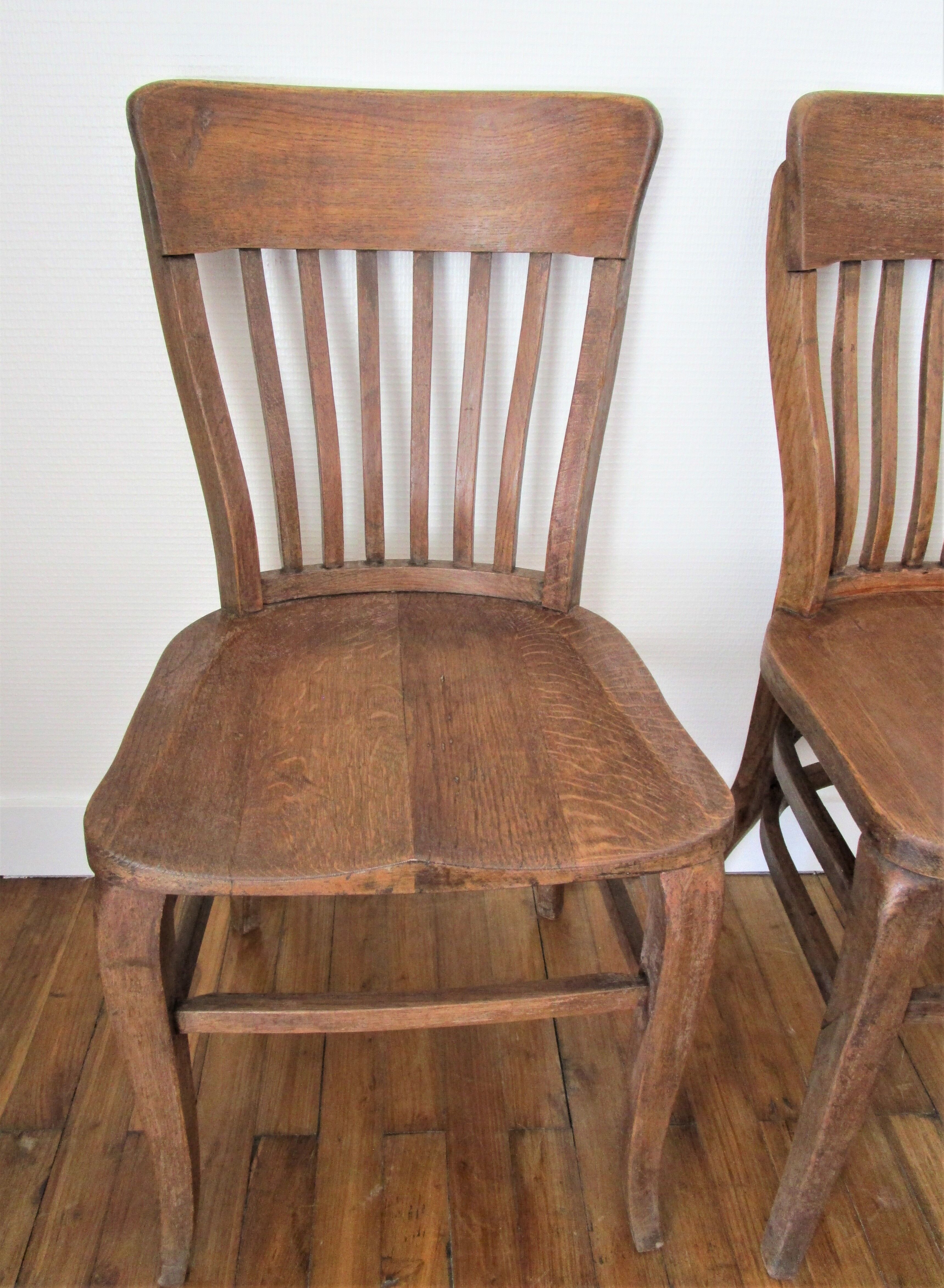 Two chairs solid oak patinated early twentieth century