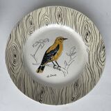 7 antique plates decorated with birds