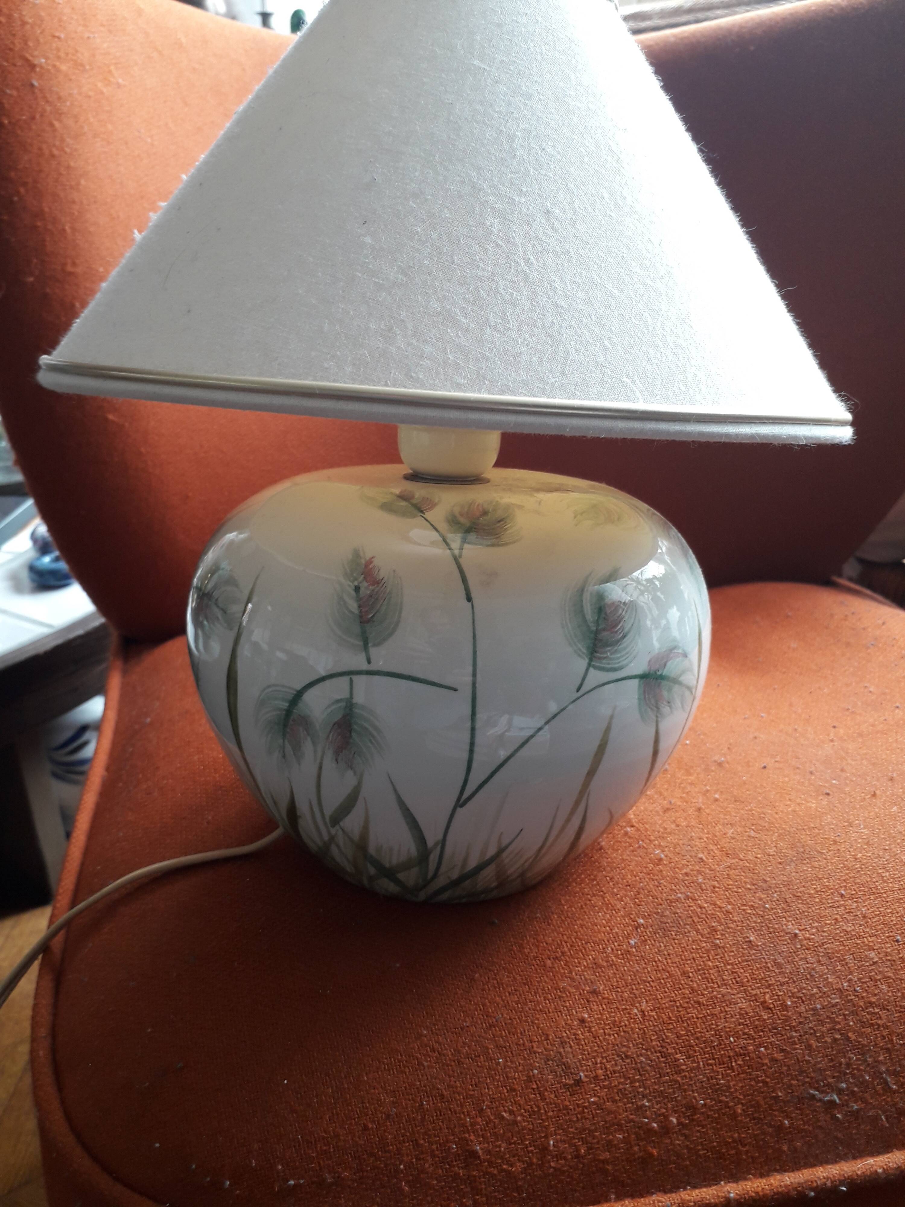 Antique ceramic lamp with floral decoration