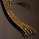 Large wall sculpture in the shape of a tree needle in brass by Curtis Jeré, mid-century modern.