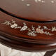 Mahogany gueridon with mother-of-pearl inlays featuring Asian floral decor.
