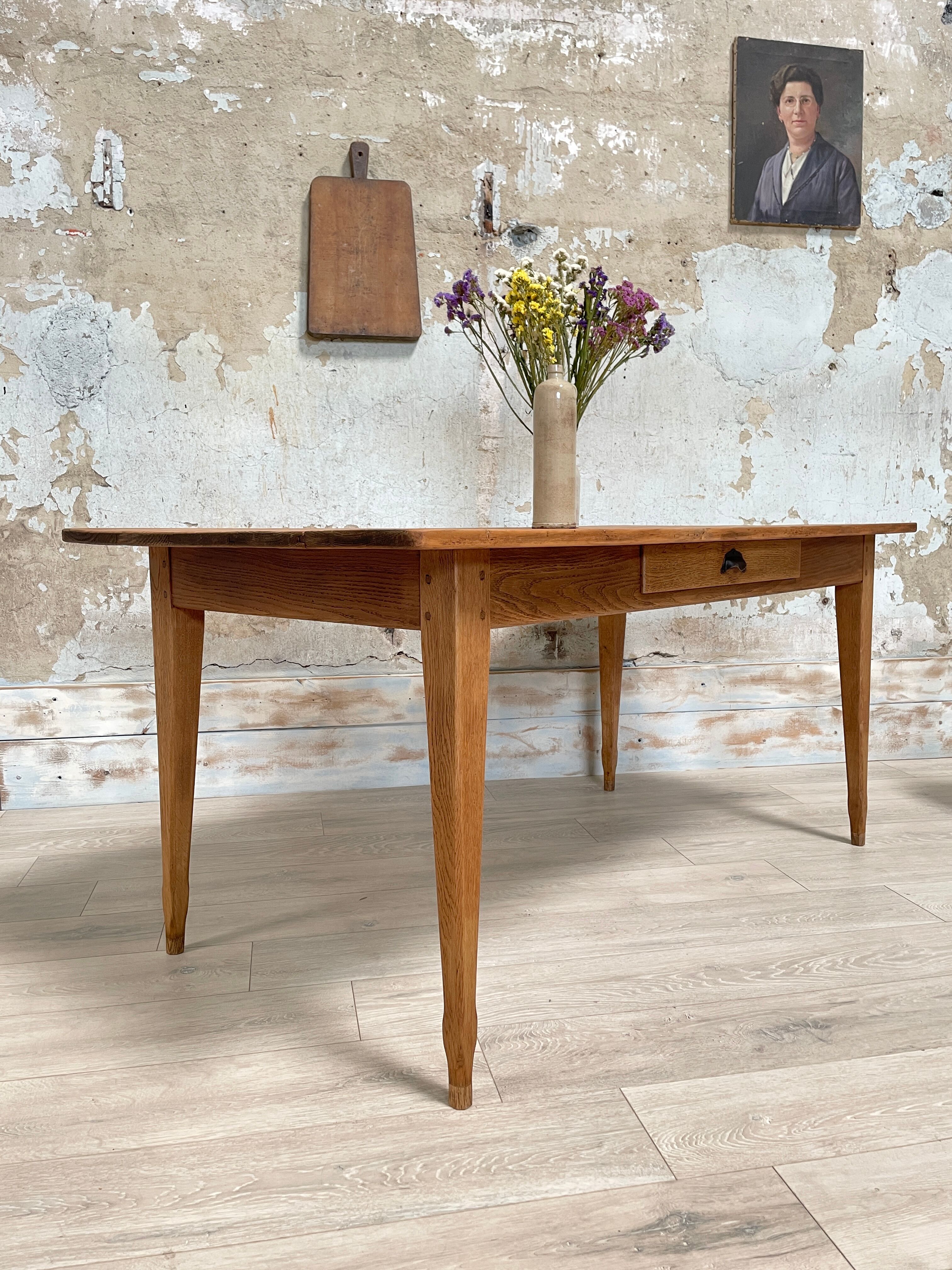 Vintage farmhouse table with spindle legs.
