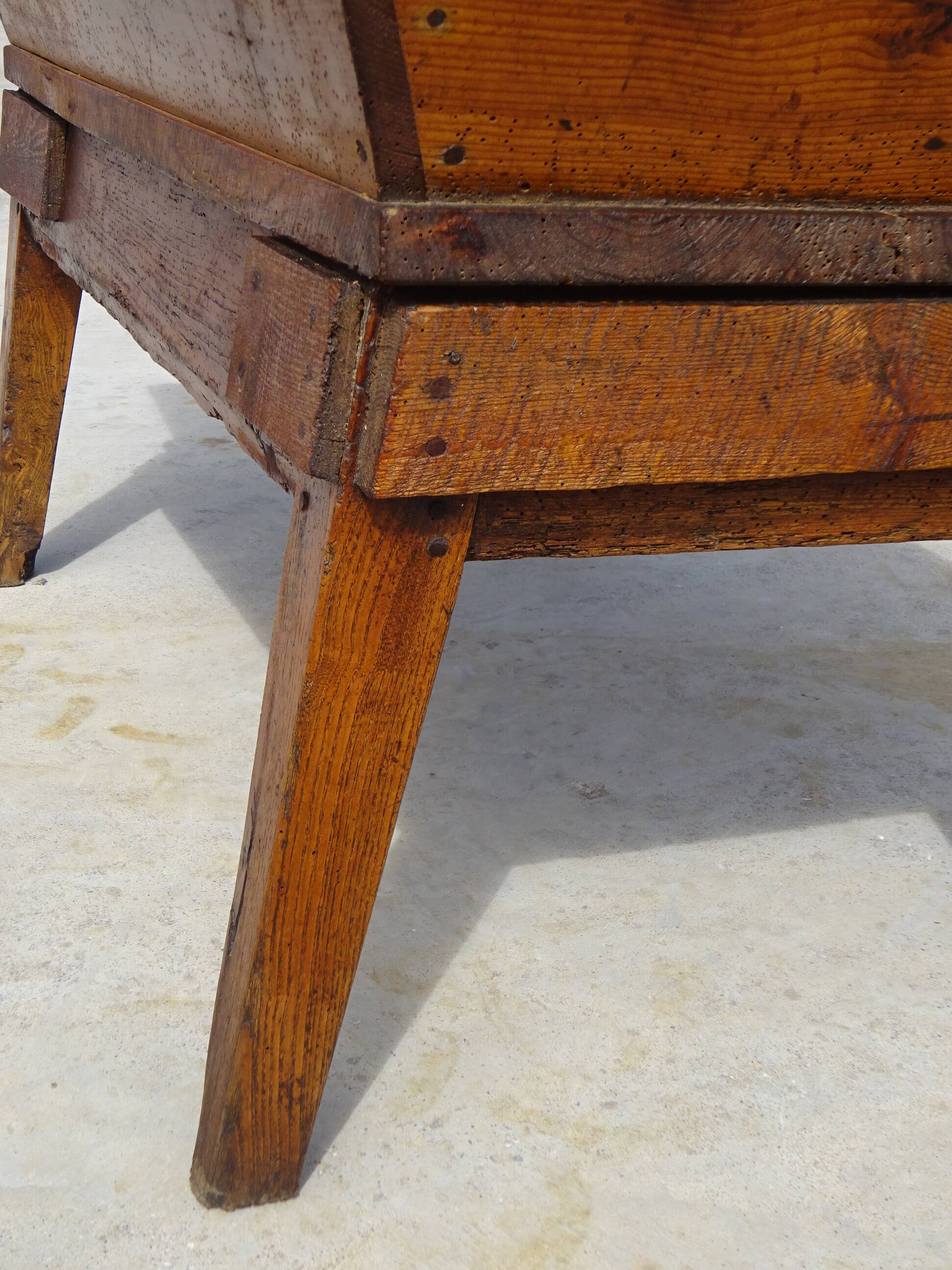 Very old solid oak dough trough with a lid and removable legs.
