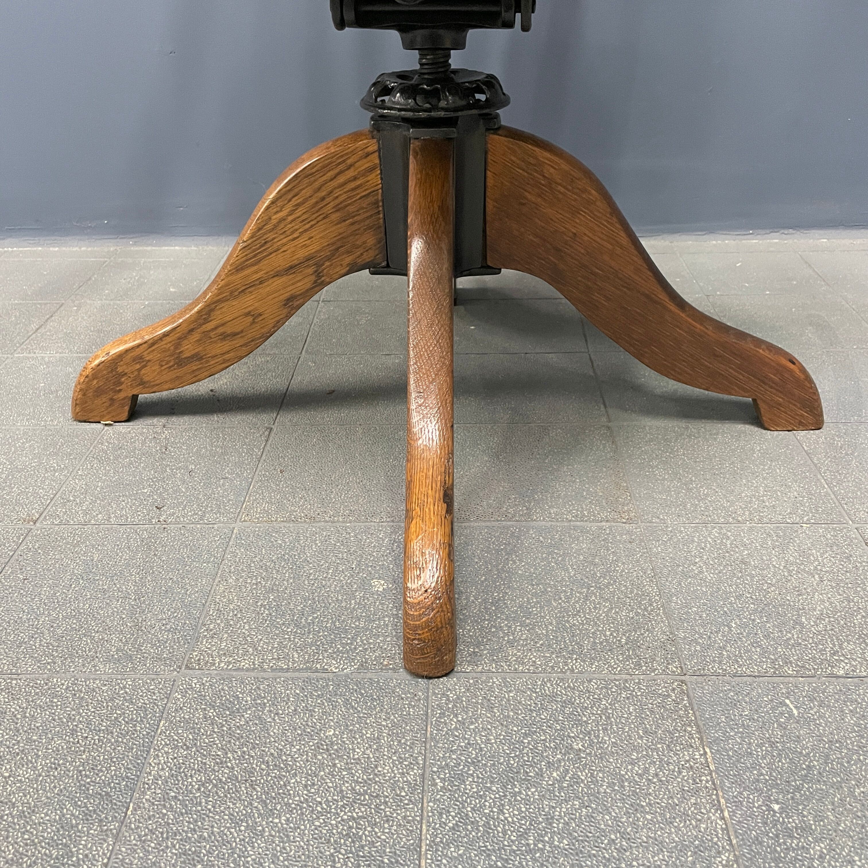 Antique American oak office chair with armrests 1920s