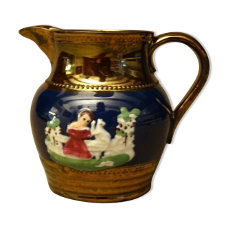 Milk pot pitcher broc in glossy earthenware Jersey decoration in relief