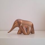 Stylized brass elephant paperweight