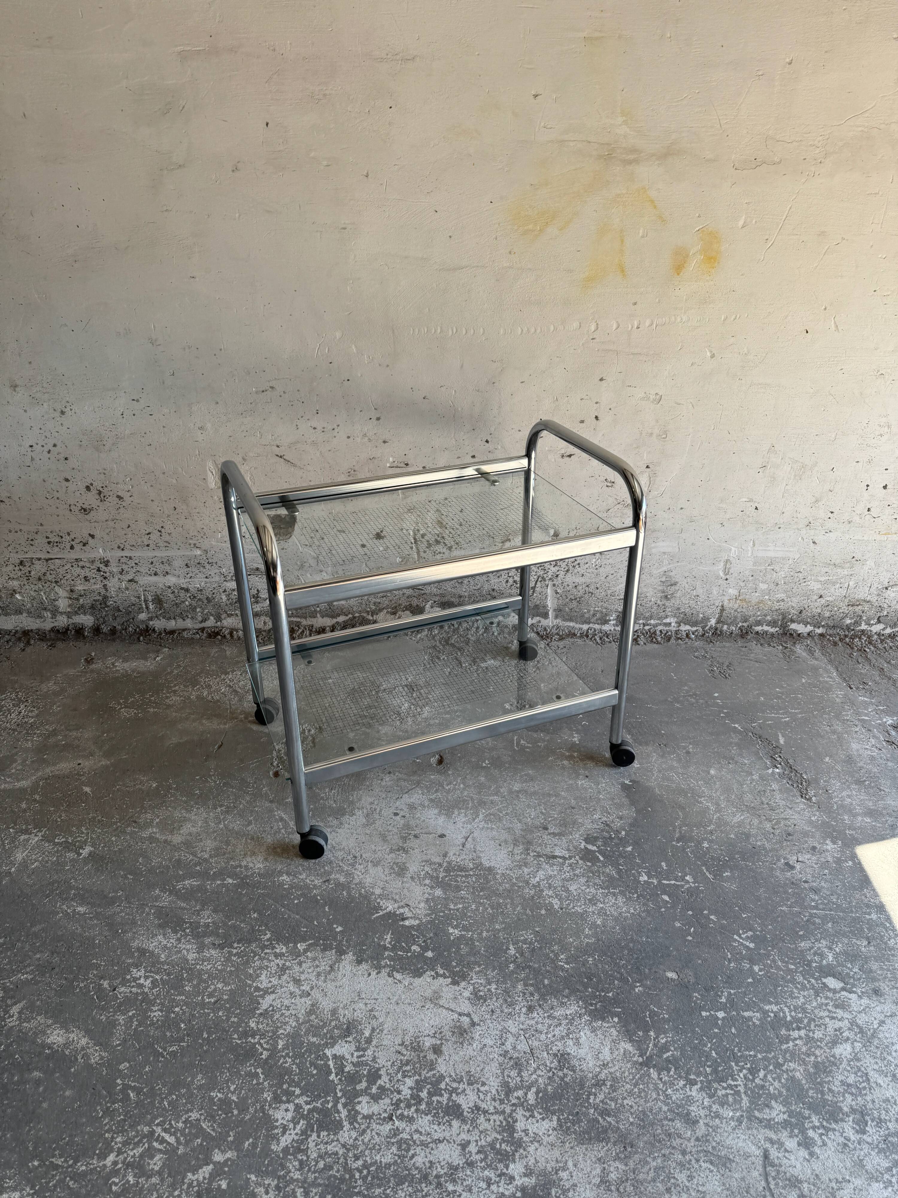Vintage silver chrome-plated steel and glass two-tier serving trolley with wheels