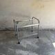 Vintage silver chrome-plated steel and glass two-tier serving trolley with wheels