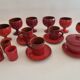 Red enamelled terracotta: cups, saucers, glasses