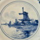 Old wall plate in blue Delft pottery