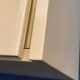 Ivory and brass lacquered library, International furniture 1970