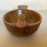 Carved wooden bird pocket