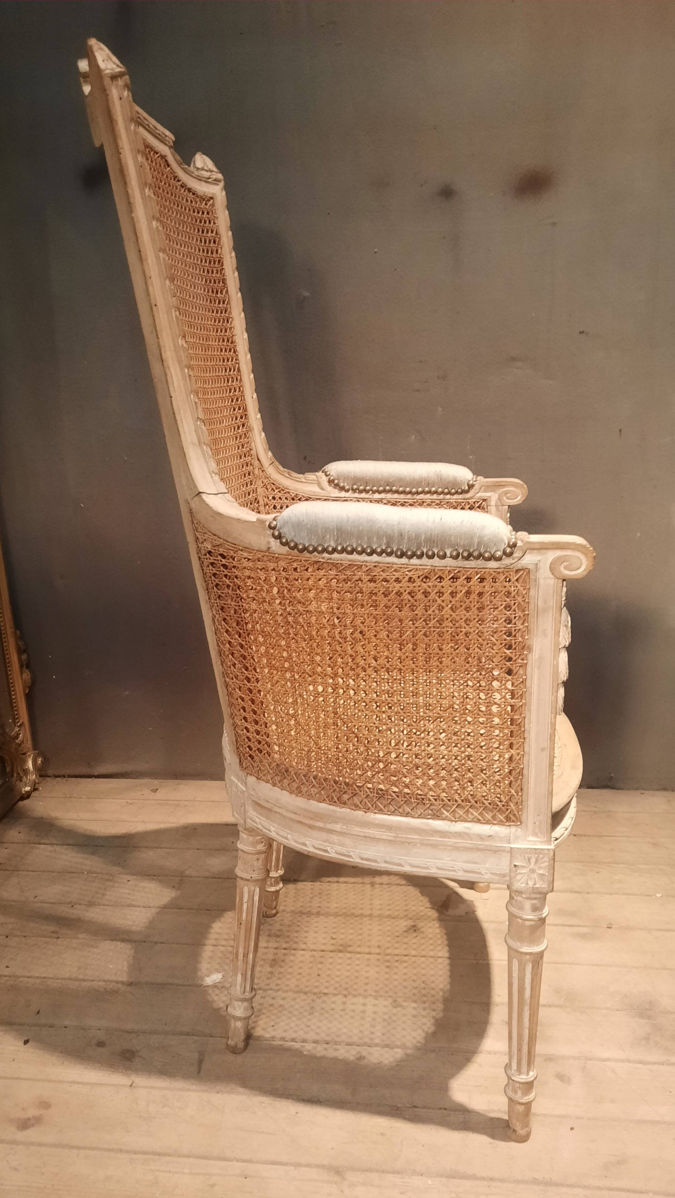 Louis XVI high-backed caned armchair