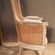 Louis XVI high-backed caned armchair