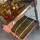 Vintage wooden and gilded brass rolling dessert trolley