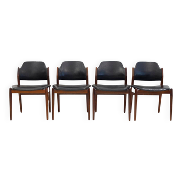 Set of four Arne Vodder chairs in hardwood and black leather.
