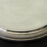 Silver-plated trivet.