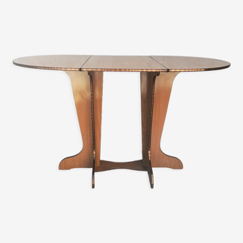 Oval table with formica flap