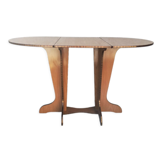 Oval table with formica flap