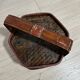 Ancient wooden and woven wicker basket,