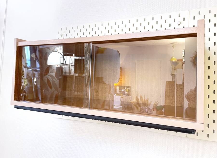 Pink glass wall bookcase, 1960