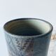 Signed ceramic tubular vase