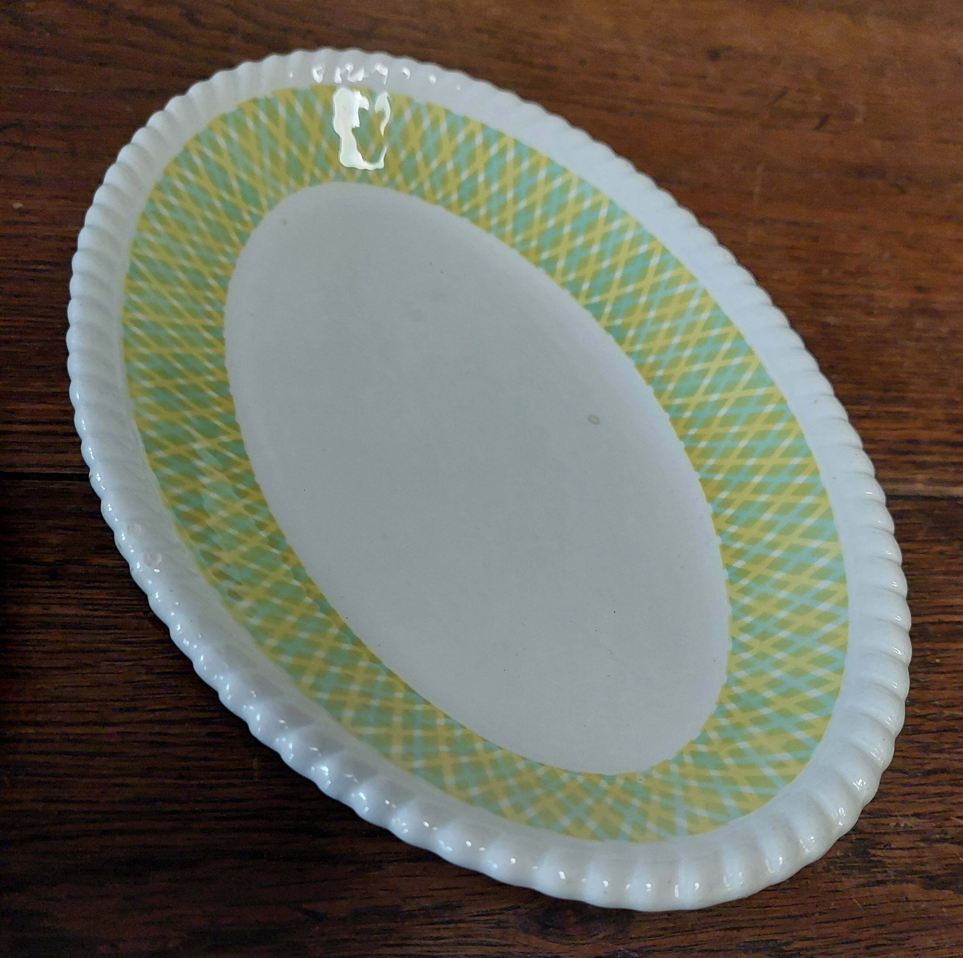 Pair of Badonviller iron earthenware dishes, Amina model