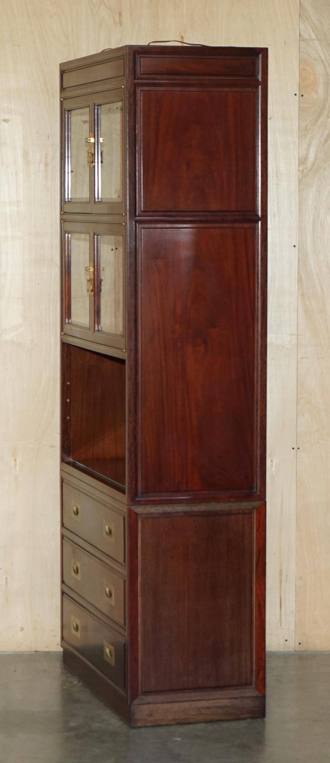 Set of three vintage hardwood military-style bookshelves.