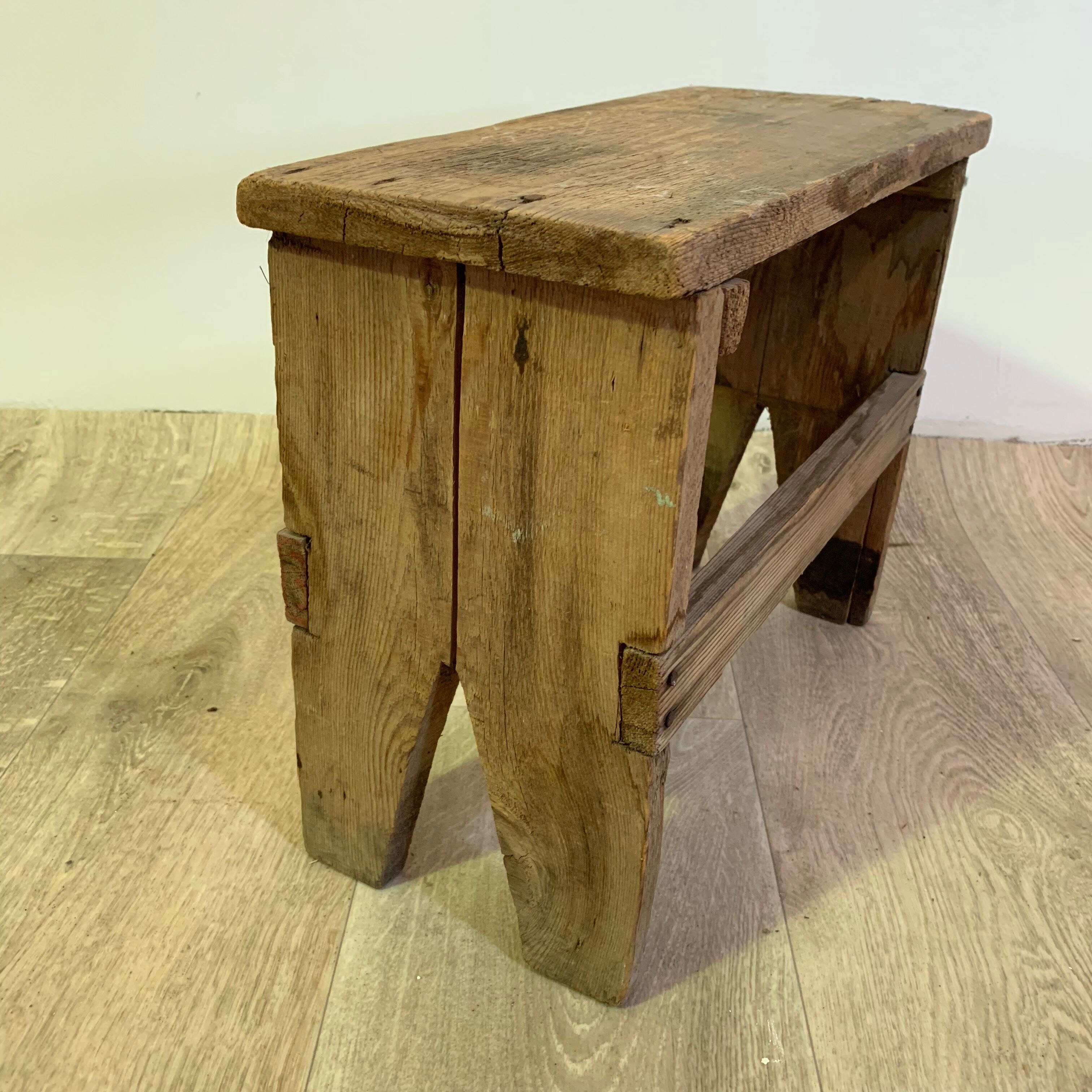 Old wooden foot foot stool