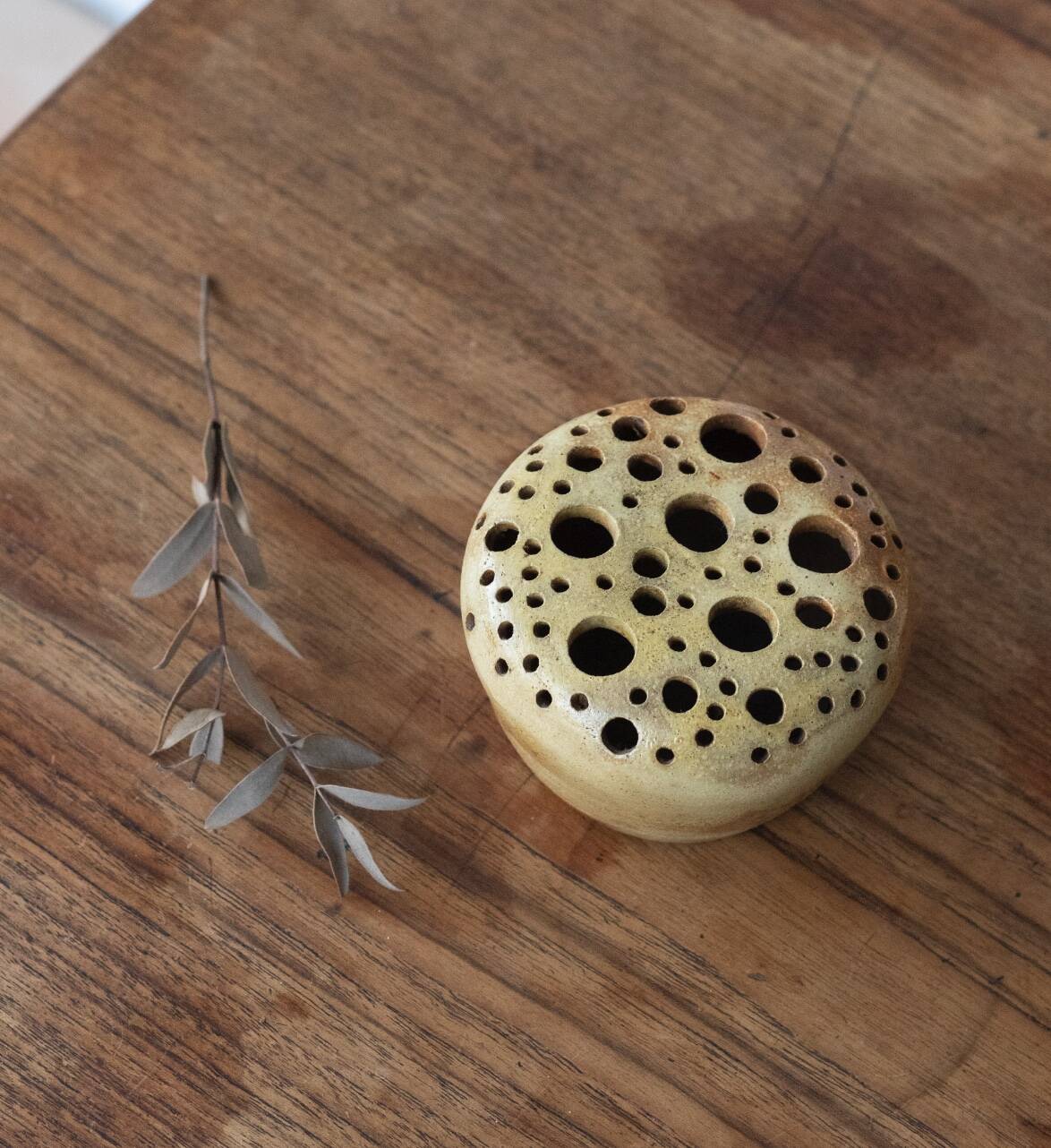 Signed sandstone flower pick