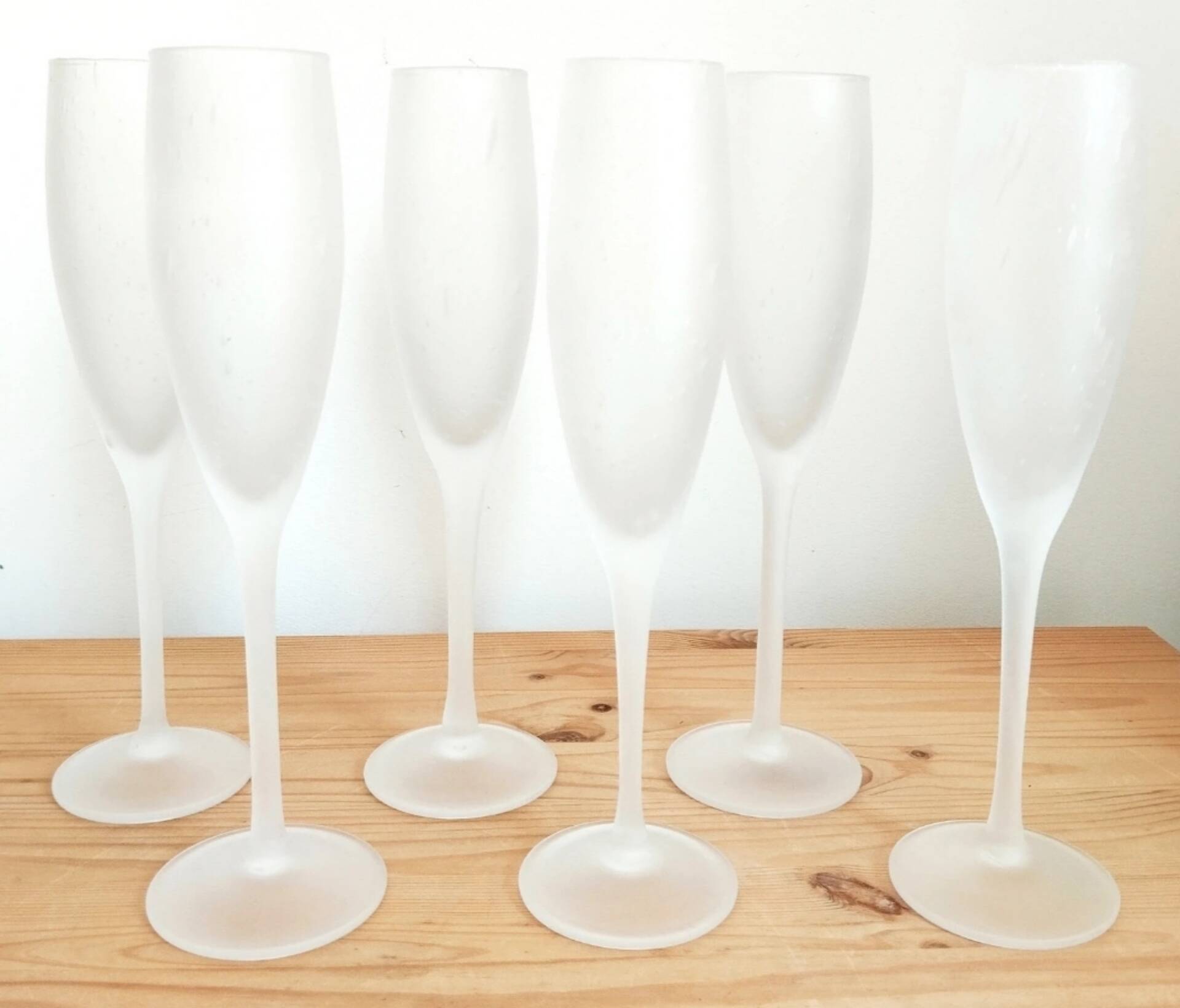 Lot of frosted bubble glass champagne flutes from Biot glassware.