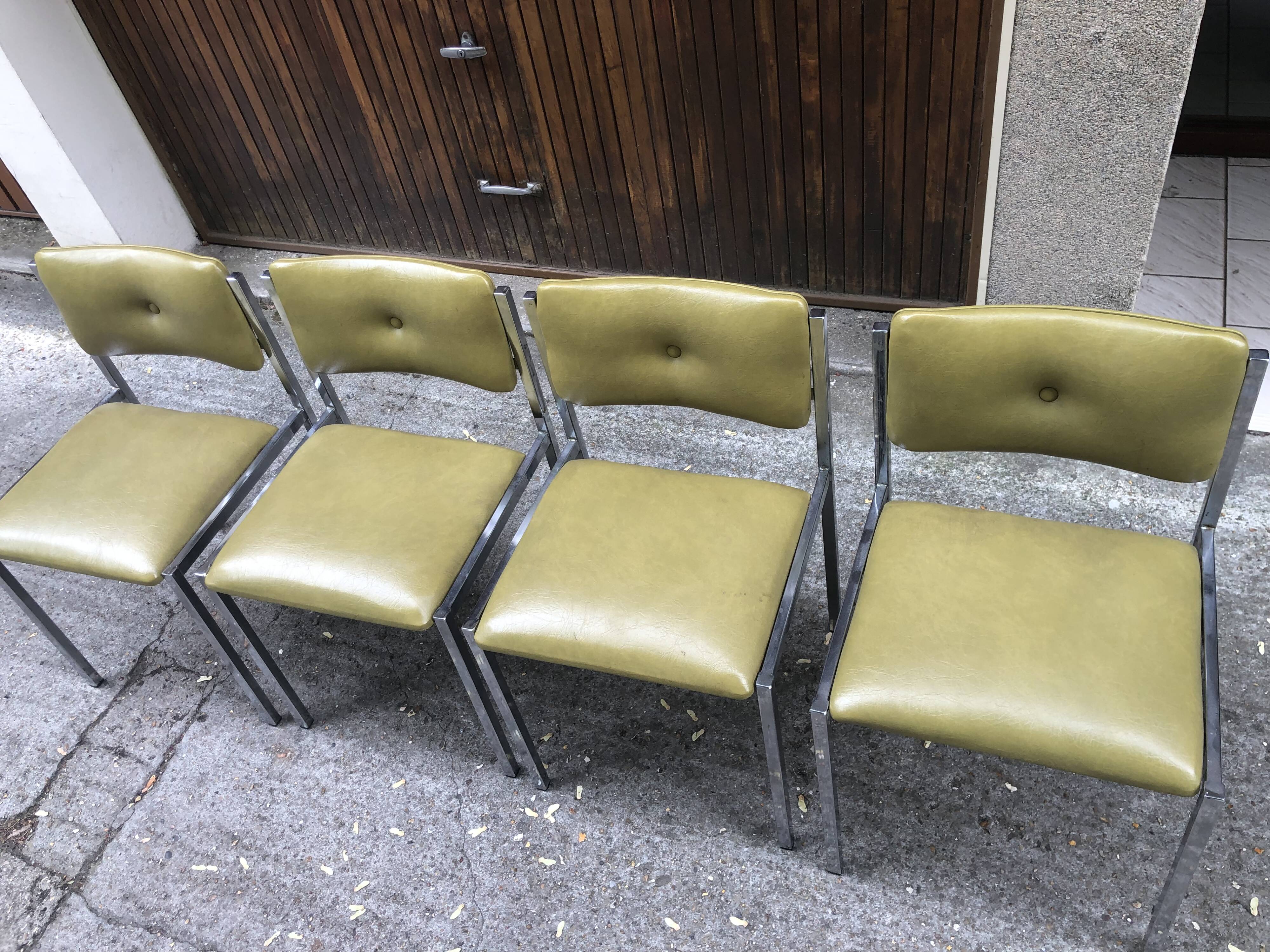 Series of 4 vintage chairs in Skaï