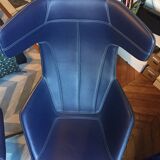 Arrow swivel armchair and foot rests by Alfredo Haberli for Moroso