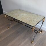 Coffee table in brushed steel and brass