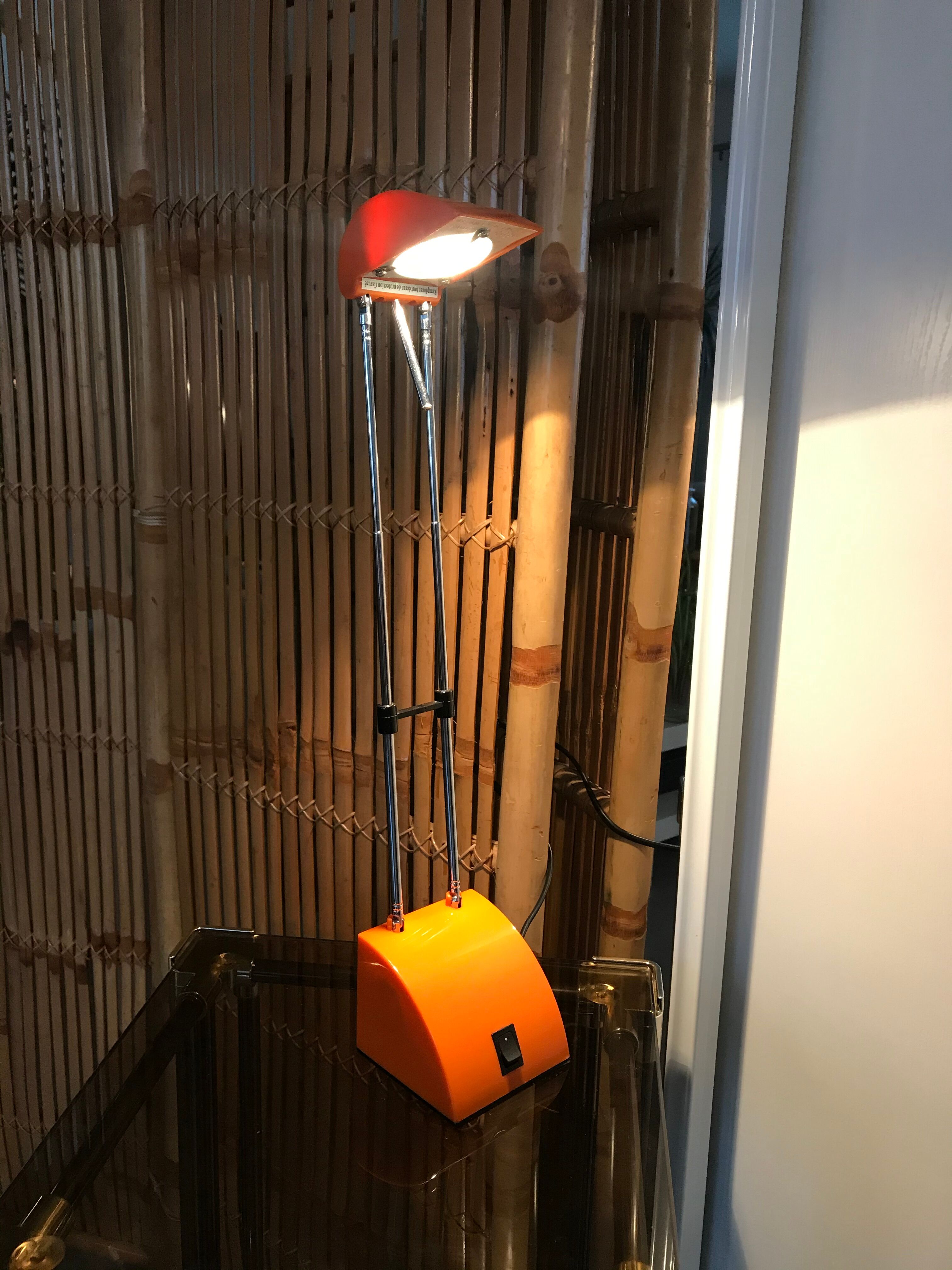 Orange telescopic desk lamp