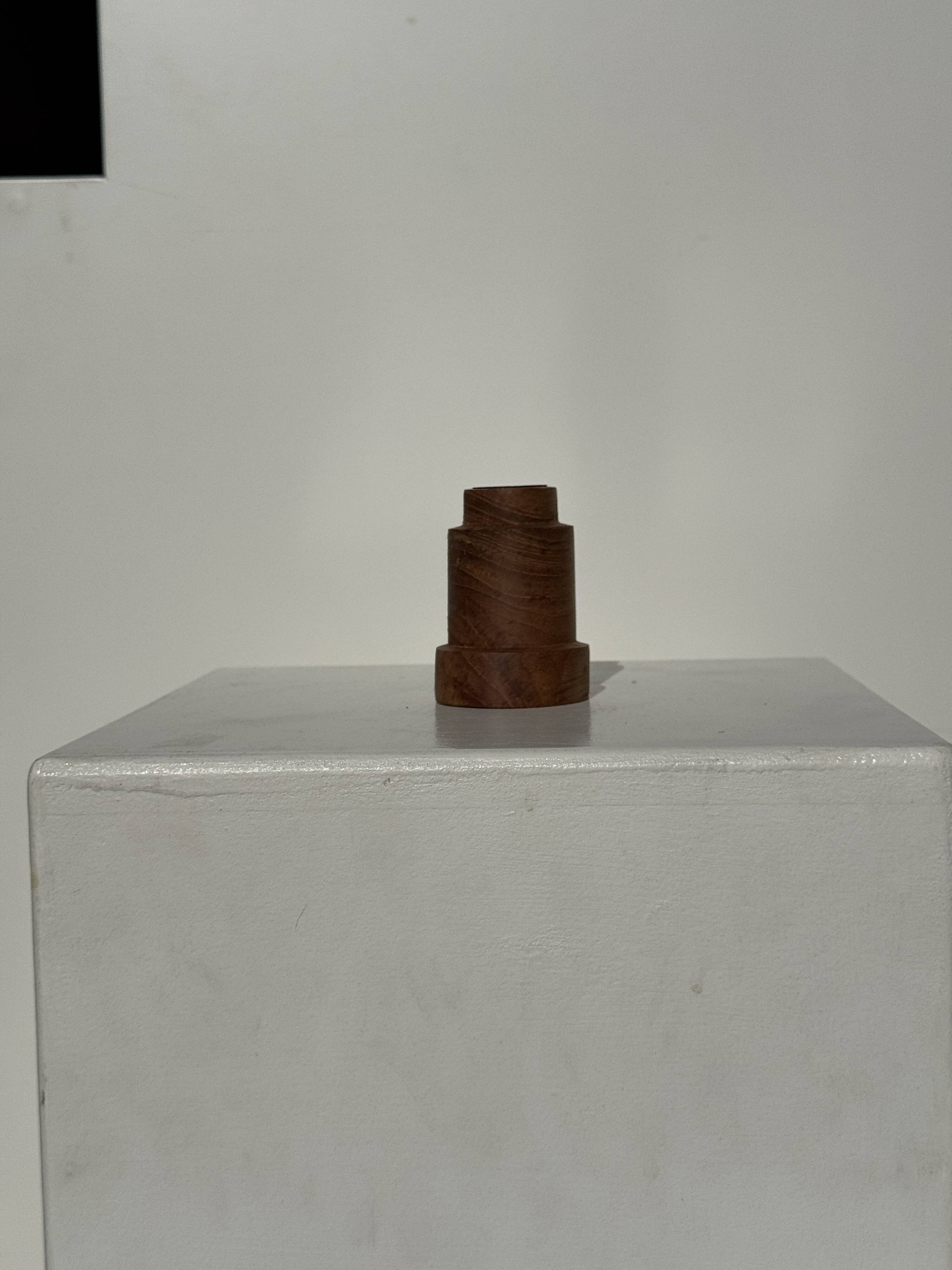 Circular teak monoxyle candlestick, pyramidal with a high central part H7 D5.