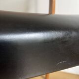 Vintage chair in wood and black leatherette