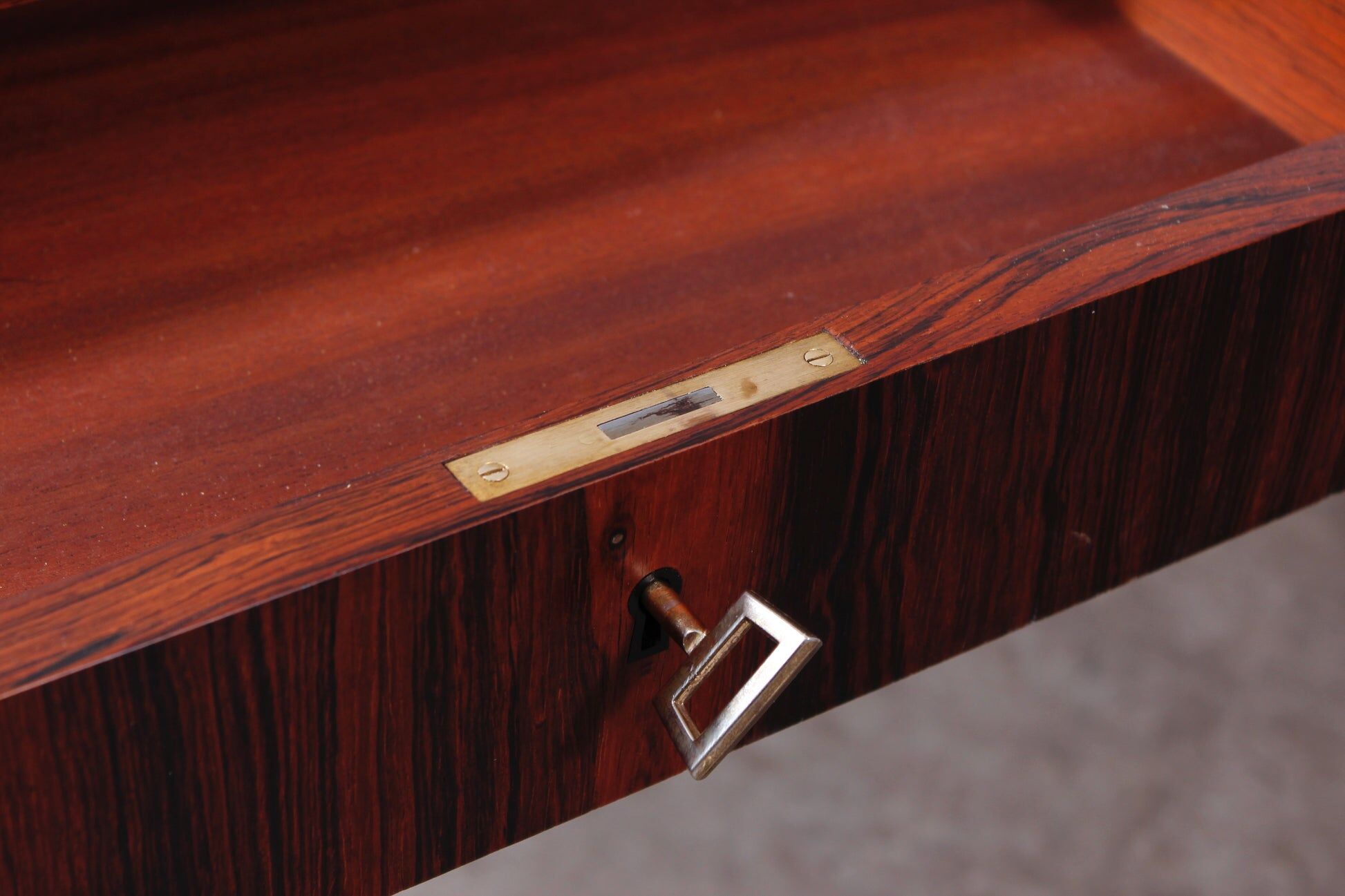 Minimalist rosewood desk by Riis Andersen