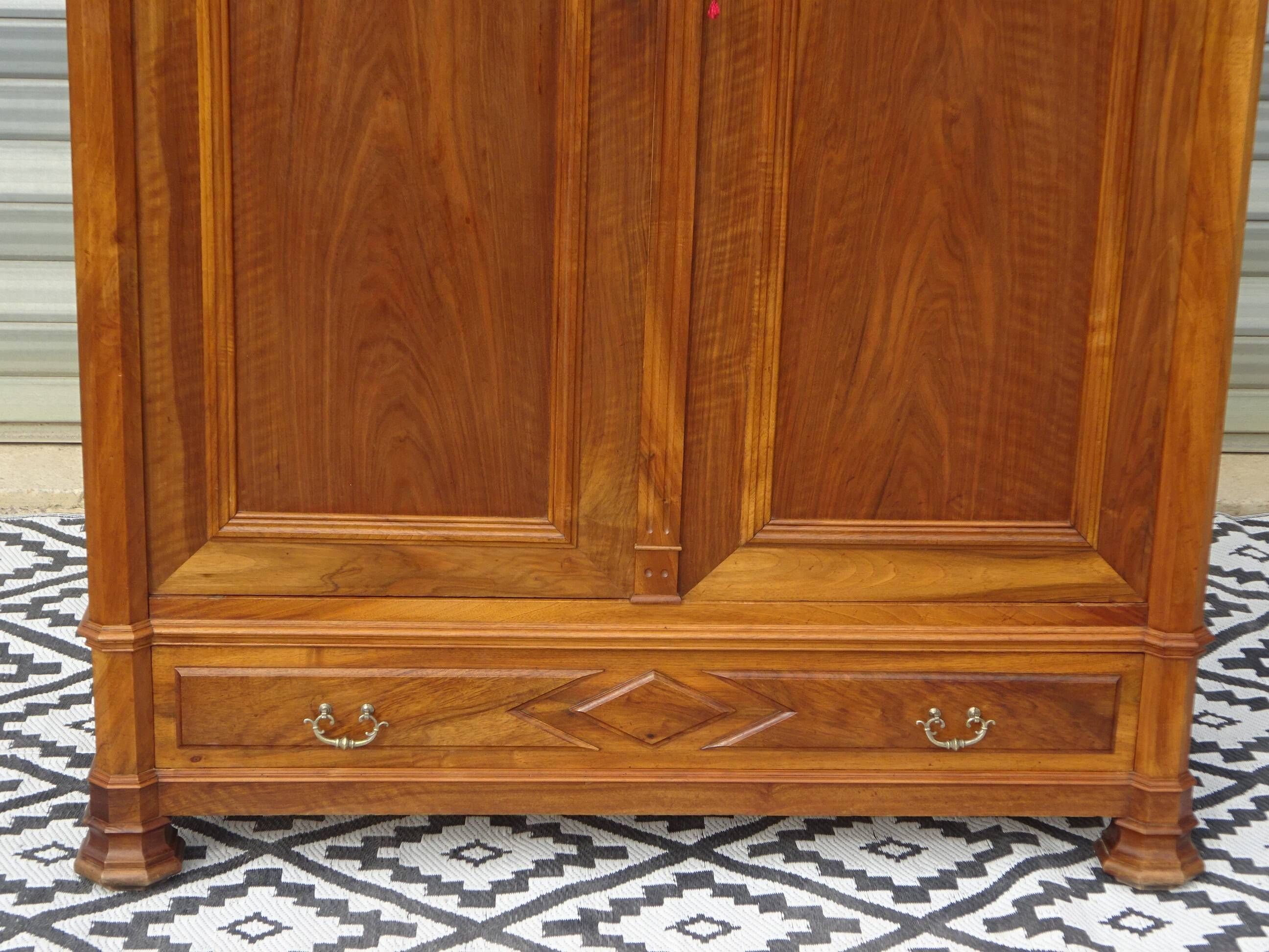 Large antique wardrobe in solid walnut