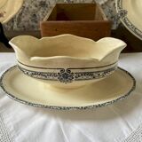 Sauceboat on a wrought iron base from Salins.