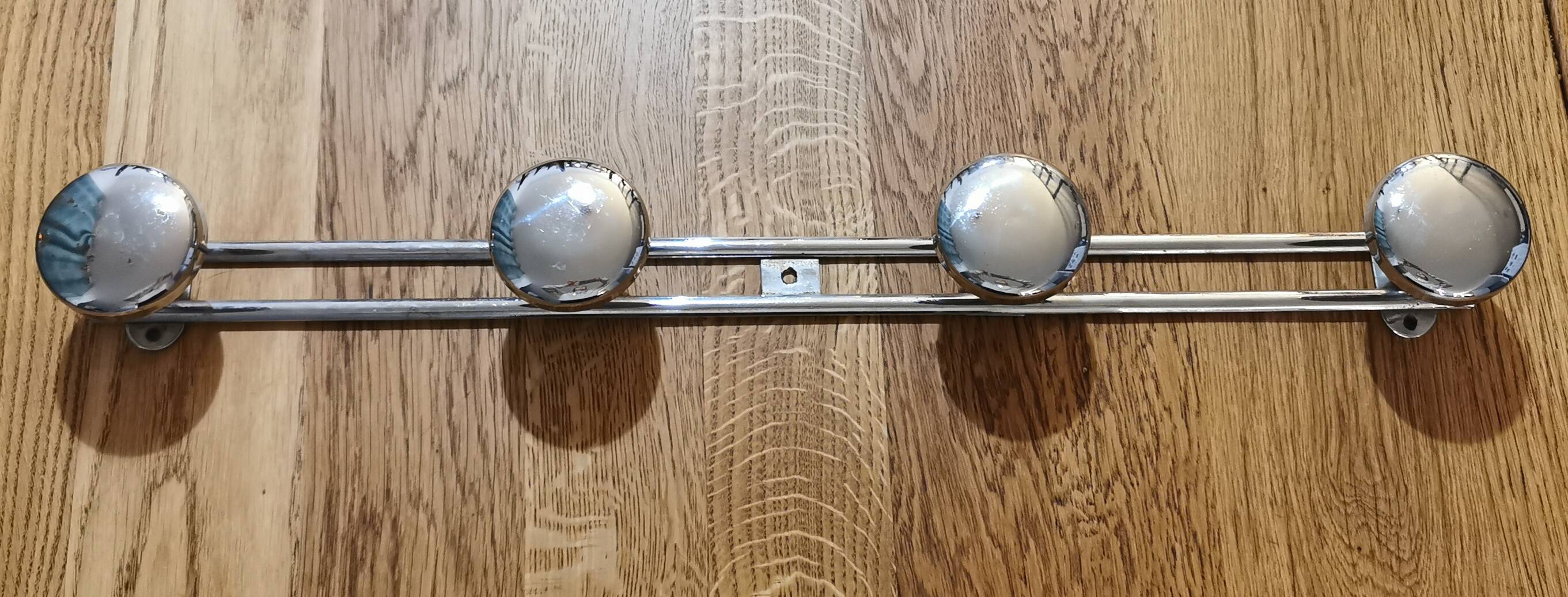 Vintage wall-mounted coat rack with 4 hooks