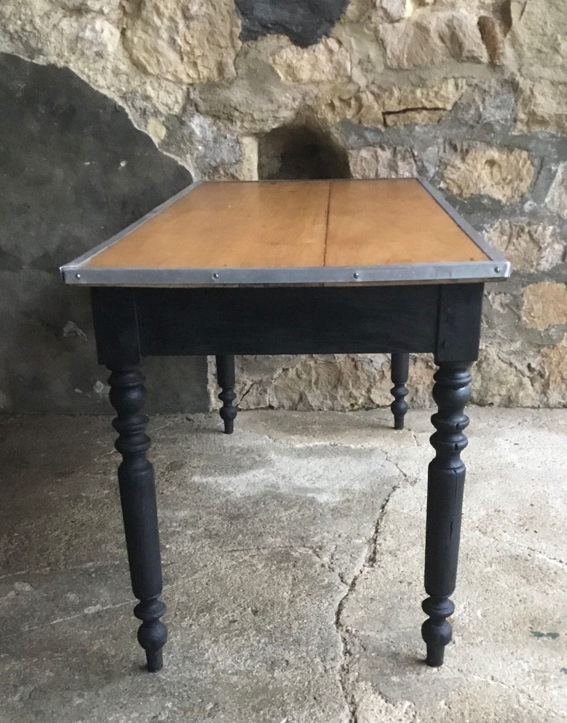 Black pietement farm table - metal strapping - turned feet - 20th century