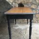 Black pietement farm table - metal strapping - turned feet - 20th century