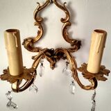 Rococo-style wall lamp in gilded bronze and crystal stamps