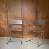 Pair of X-Line chairs by Niels Jørgen Haugesen by Magnus Olesen
