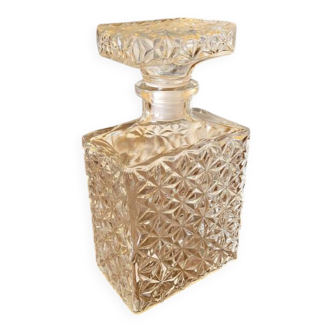 Rectangular whisky carafe made in France with geometric patterns.