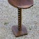 Art deco style pedestal table in beech and gold metal
