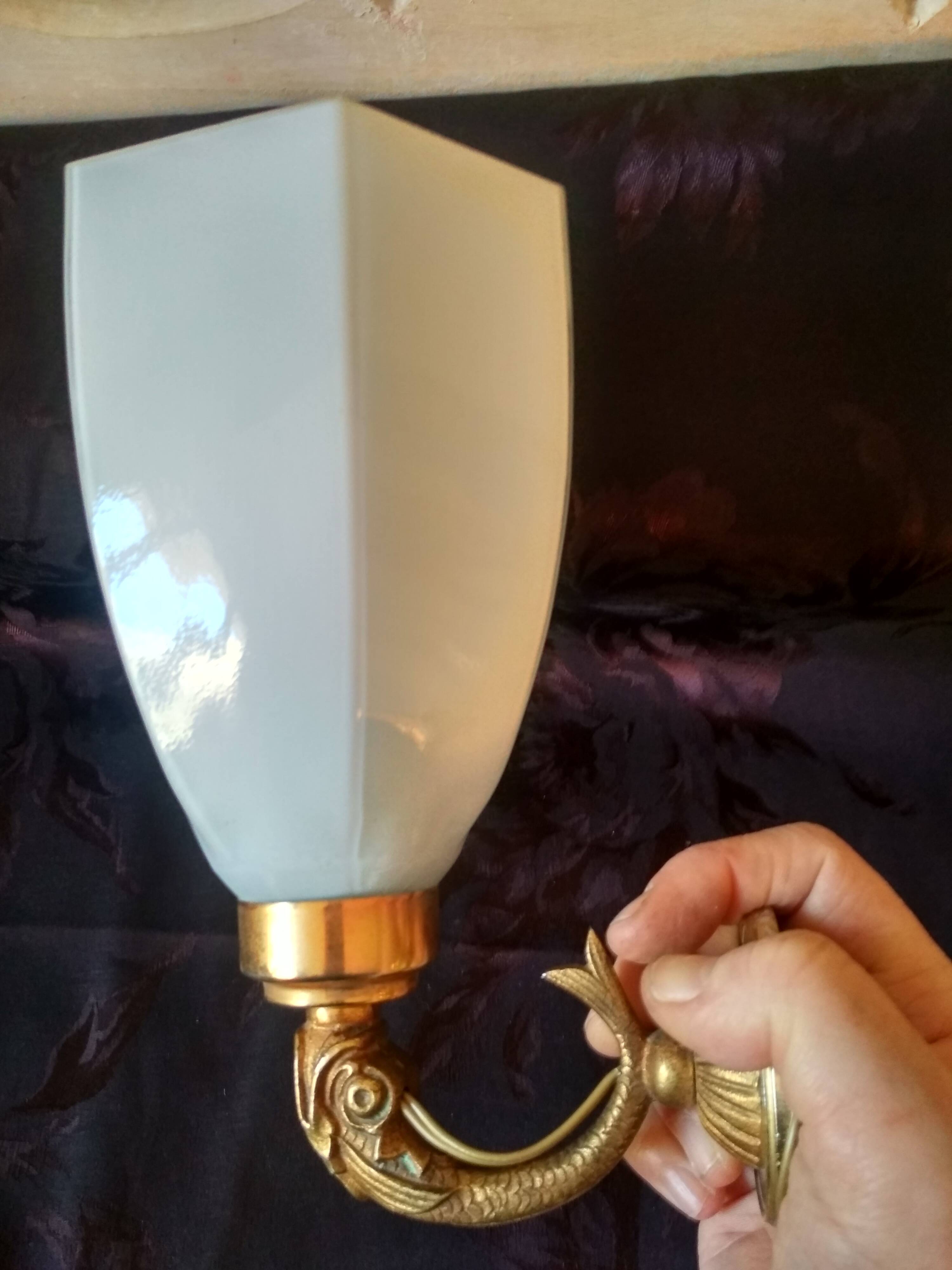 Golden brass wall light with glass tulip - dolphin pattern bathroom lamp